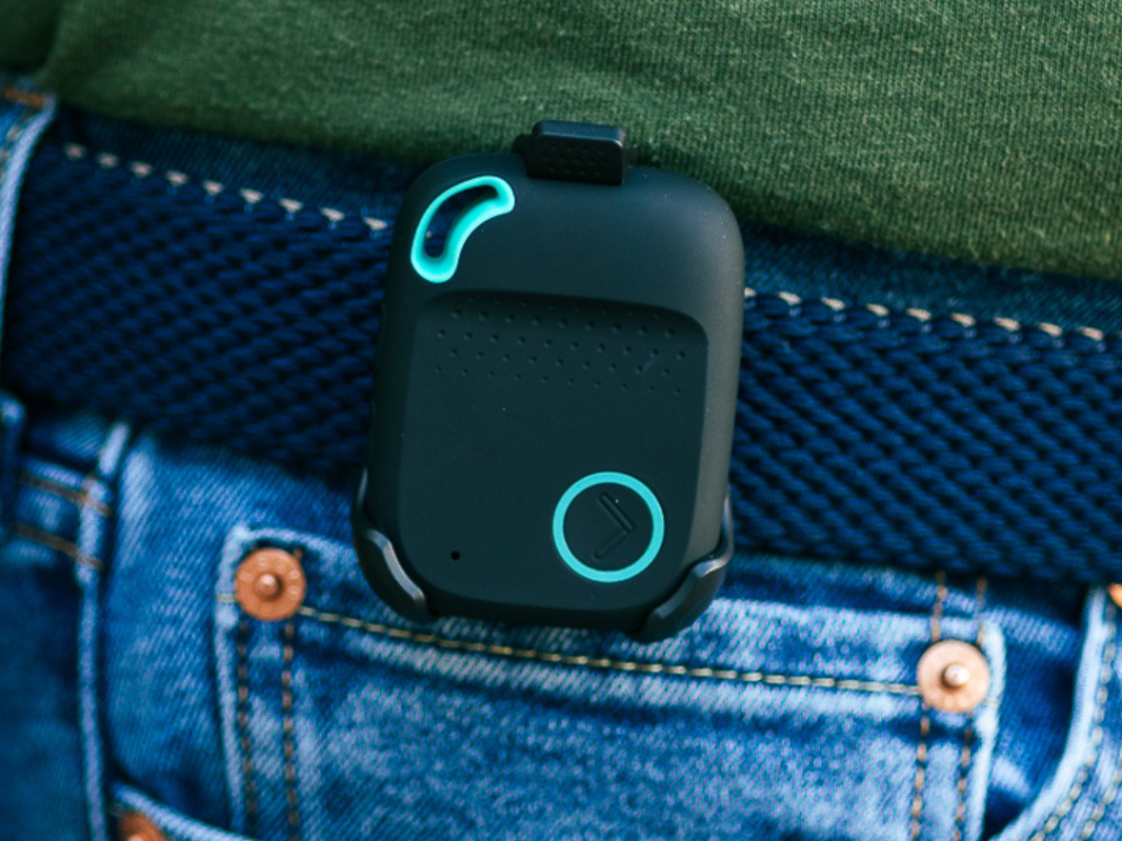 A Latitude Mobile Alert hanging on a belt